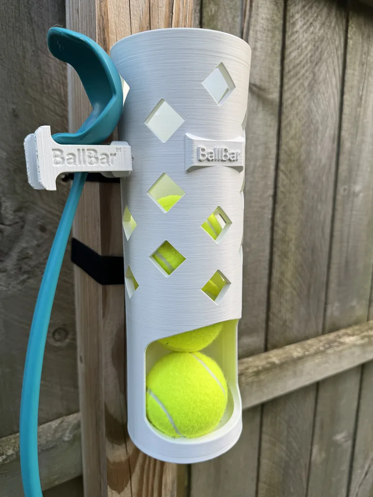 A ball launcher hanging from the built-in chucker hook on a BallBar