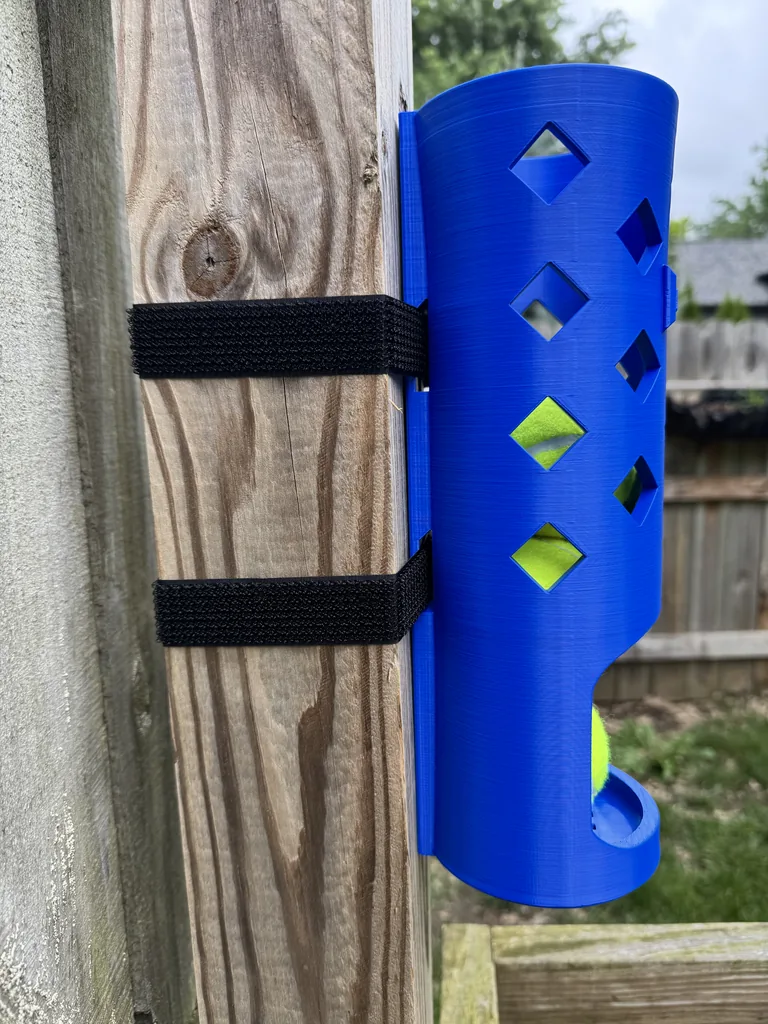 Hands wrapping the removable Velcro strap around a post to mount a BallBar